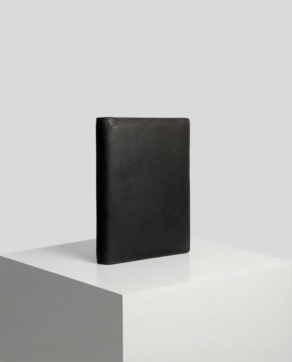 stående Planner Case i Sort læder på pedestal